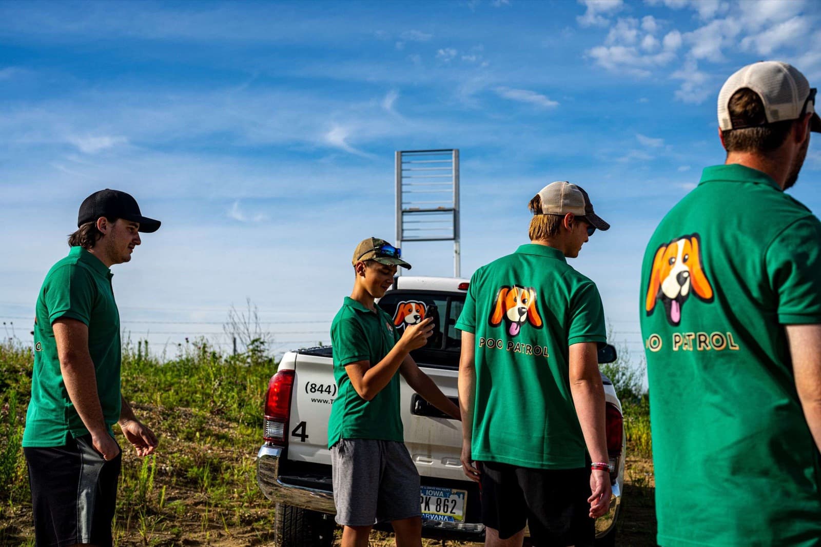 Poo Patrol commercial pet waste removal crew with service truck